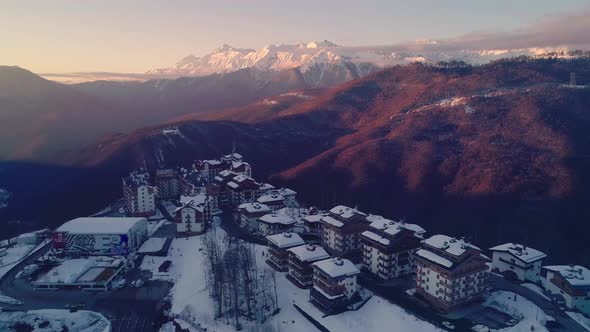 Sunrize Morning Aerial View of the Olympic Mountain Village Roza Plato