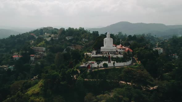 Aerial of Big White Buddha statue in Kandy. Bahirawakanda Vihara Buddha Statue, Kandy, Sri lanka alt