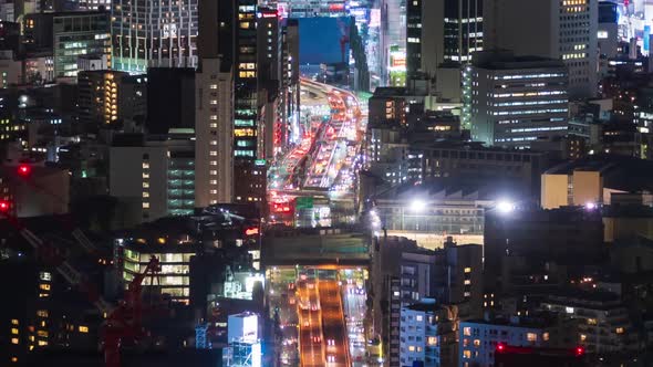 time lapse of the Metropolitan Expressway no.3 Shibuya Line and city at night in Tokyo, Japan alt
