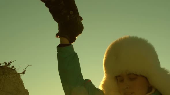 Climbers Traveler Climbs Mountain Helping Each Other. Free Woman, Traveler Climb Mountain Holding alt