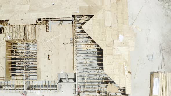 Aerial Drone View of New Residential with Wooden Truss Post and Beam Stick Built Construction alt
