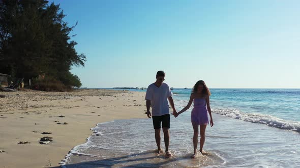 Young Lady and Man After Marriage in Love Have Fun on Beach on Paradise White Sand  alt