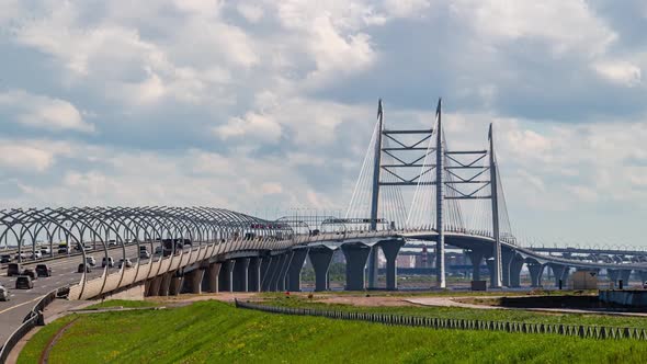 Car Traffic on the Modern Bridge at Rush Hour Timelapse alt