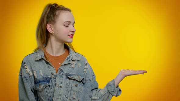 Girl Pointing Empty Place Advertising Area for Commercial Text Copy Space for Goods Promotion alt