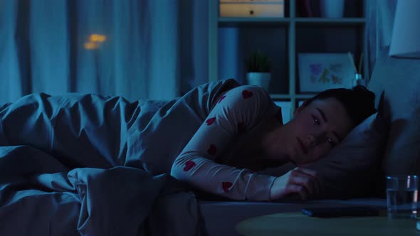 Teenage Girl Awaking Because of Phone at Night alt