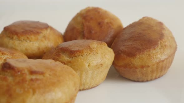 Cornmeal on white plate arranged for breakfast slow tilt 4K 2160p 30fps UltraHD footage - Cornbread  alt