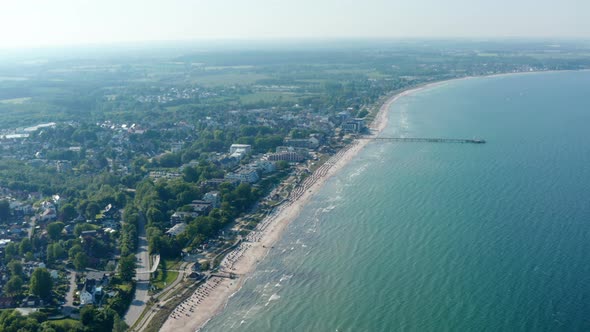 Wonderful Aerial Drone View of Baltic Sea Coast Shoreline in Scharbeutz Germany Circle Pan Sunny alt