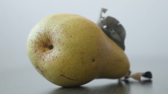Tasty   organic pear on the table close-up 4K 2160p UltraHD tilting footage - Details on fruit from  alt