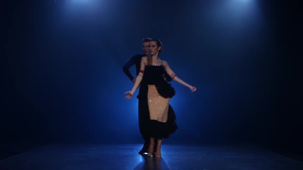 Jive Dancing Pair of Professional Elegant Dancers in Smoky Studio alt