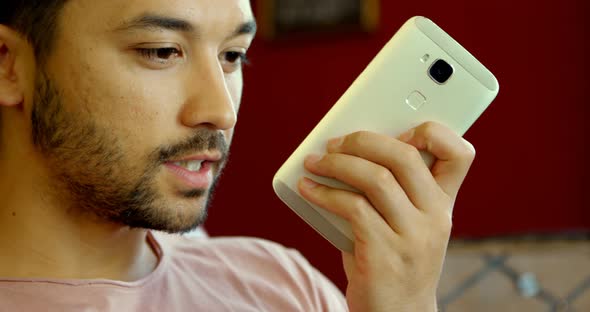 Man talking on mobile phone 4k alt