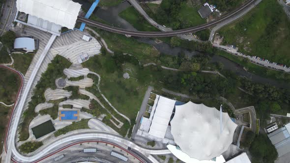 Aerial view of LRT Train Station, railway, river and KL Sports City