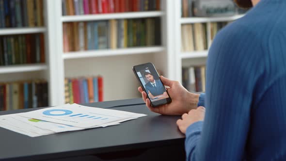 Businessman telling a project at home office remotely alt