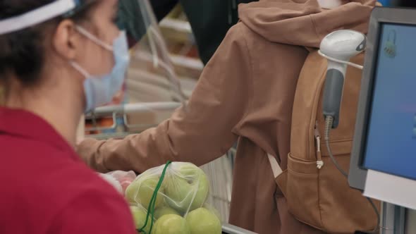 Young Couple At Checkout alt