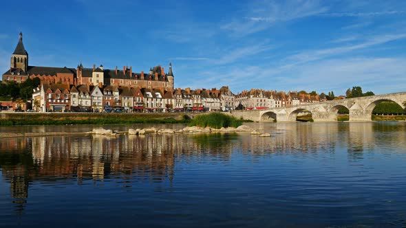 Gien, Loiret, France. The castle and the church overlooking the Loire river. alt