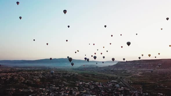 Hot Air Balloons Hover Over the Valley
