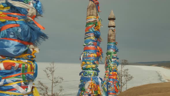 Pillars with Colored Ribbons Are a Religious Symbol in the Sacred Place of Olkhon Island on Lake