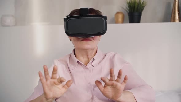 Middle Aged Woman in Google Glasses on Vr Helmet