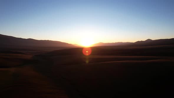 Bright Yellow Dawn with a Red Autumn in Mountains alt