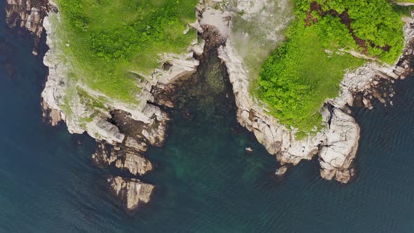 View From a Drone Vertically Down on the Rocks of Cape Kuzmin alt
