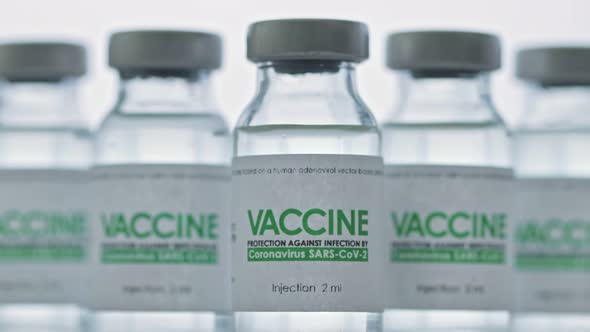 Flasks of Vaccine for COVID19 Coronavirus Cure are in Research Lab Before Injection alt