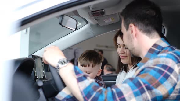 Happy Family Buys a Car on Credit alt