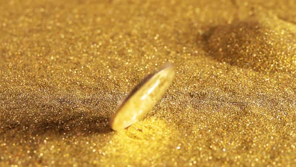 Bitcoin Spins on a Table Strewn With Golden Sand
