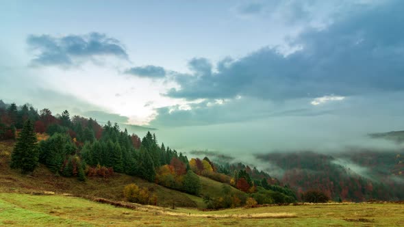 Morning Mist Over the Valley Among the Mountains in the Sunlight. Fog and Beautiful Nature of alt