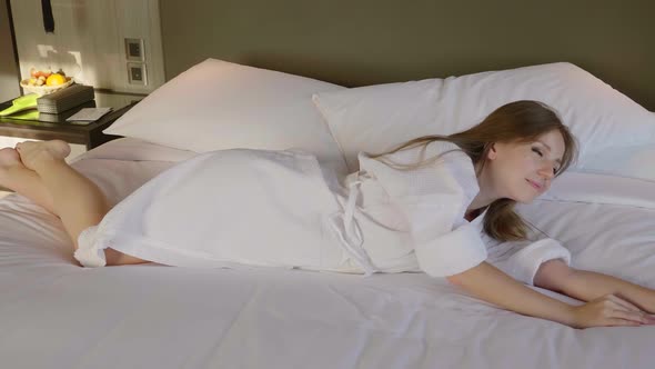 Woman in Bathrobe Relax and Leisure in Hotel Covid19 Quarantine alt