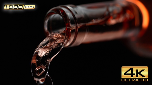 Pouring Rose Wine from Bottle alt