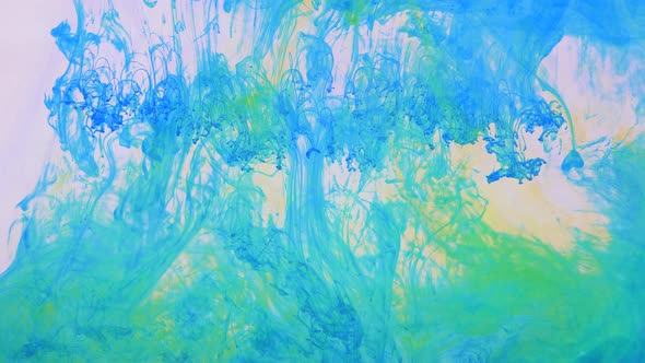 Liquid Abstractions the Dissolution of Blue and Yellow Paint in Water alt