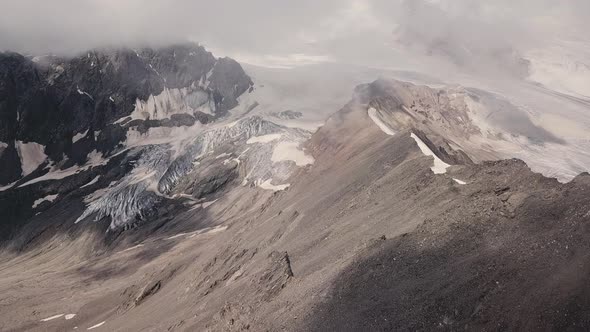 Cold Mountain Peaks Covered By Snow and Glaciers