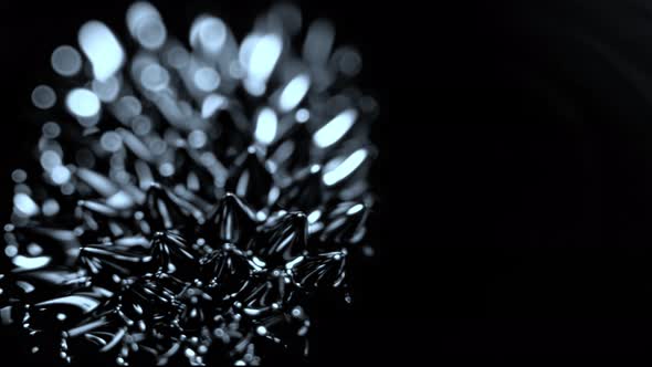 Super Slow Motion Macro Shot of Magnetic Liquid Ferrofluid in Motion at 1000Fps alt