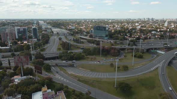 Aerial view of Panamericana highway and General Paz avenue interchange with commuters alt