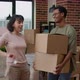 Diverse Couple Celebrating First Home Purchase to Move in Together - VideoHive Item for Sale