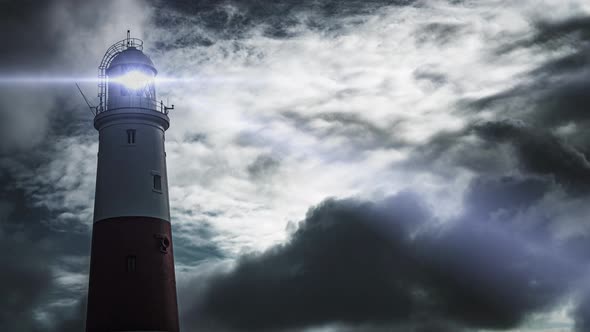 Large lighthouse at sunset time lapse