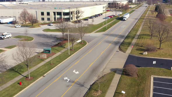 freight tractor trailer on empty highway in Chicago on sunny calm day alt