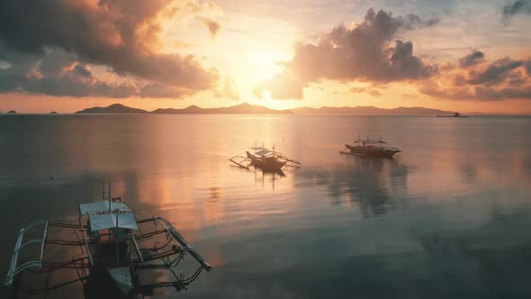 Aerial Pink Sunset is Reflected on Surface Sea alt