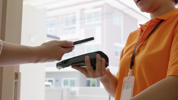 Mobile contactless cashless e-wallet digital payment home delivery. alt