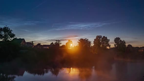 Comet C 2020 F3 NEOWISE in the Night Sky with Silvery Clouds, a Beautiful Night Time Lapse alt