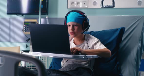 Gamer in Headset Playing in Hospital Ward alt