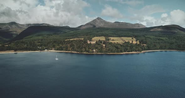 Scotland Brodick Ocean Bay Aerial View Alone Sailboat at FirthofClyde Gulf Water alt