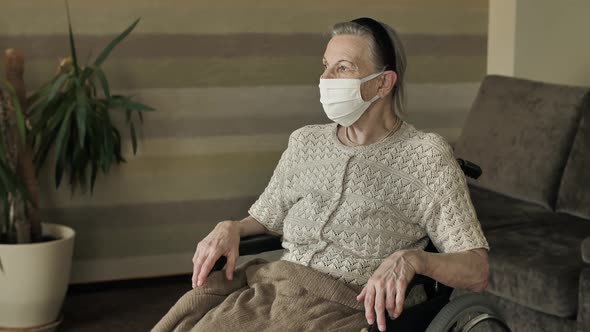 Disabled Senior Woman in Face Mask alt