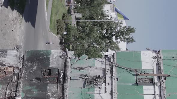 Vertical Video of the Consequences of the War in Ukraine  a Destroyed Building alt
