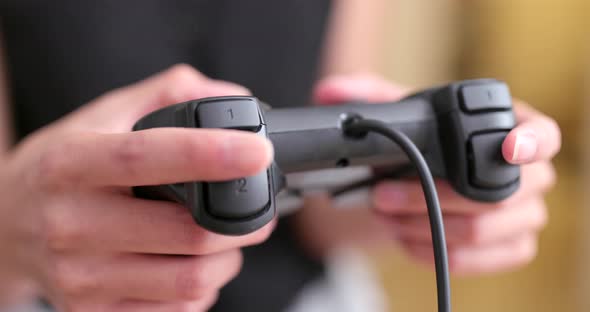 Woman playing video game alt