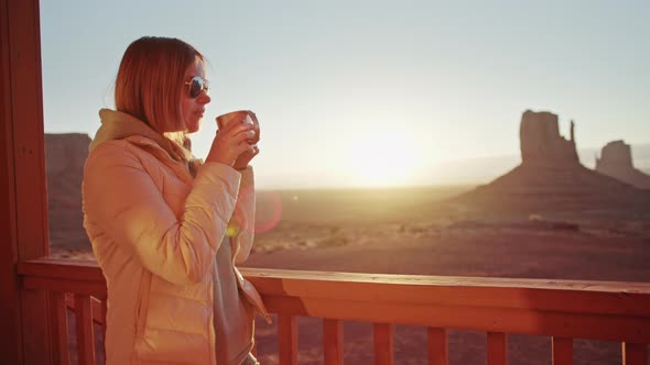 Beautiful Woman at Hotel Balcony with Great Nature Landscape Drinks Hot Coffee alt