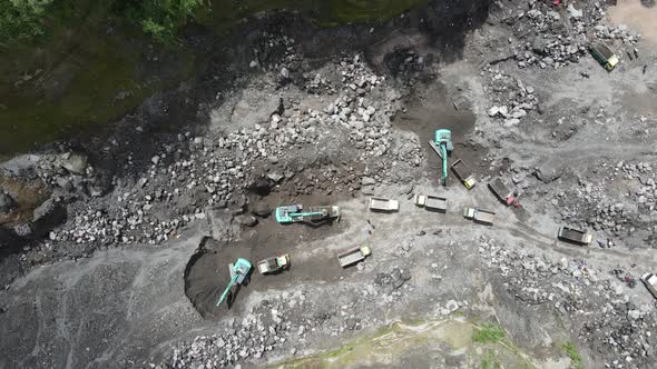 Aerial view of sand and stone mining activity in Merapi mountain Indonesia. alt
