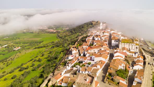 Aerial hyperlapse moving timelapse with a drone in Monsaraz village and beautiful castle, in Portuga alt