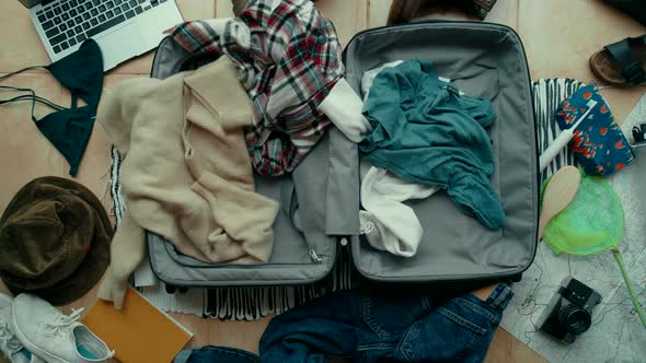 Stressed Person Late for Travel Pack Suitcase alt