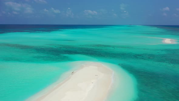 white sand beach, sandbar in tropical Seychelles, on high tide, beautiful crystal clear waters alt