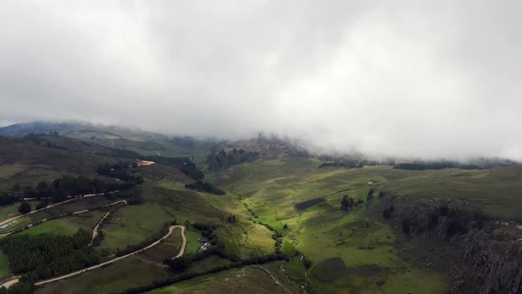 Distant View Of The Famous Rock Forest With Overcast In Cumbemayo In Peru. aerial alt